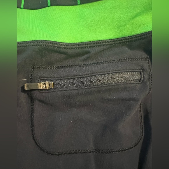 Lululemon Capri athletic pants. Navy blue with green trim. Size 10 without tags. - Picture 3 of 6